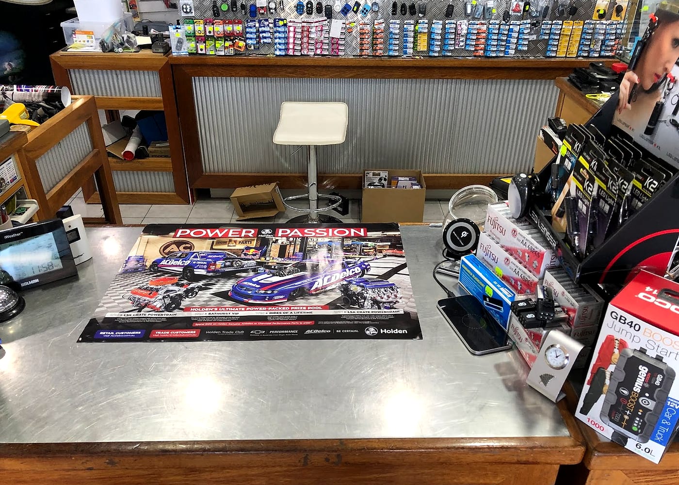 The service counter at The Battery Co with product displays